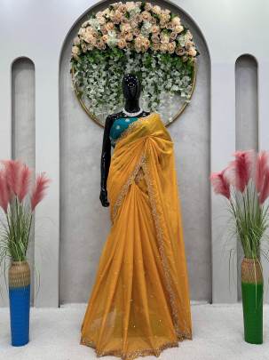 haldi special mustard yellow tebby silk saree with tread and moti work 