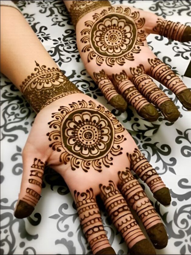 Sun inspired Mehendi design with finger detailing For wedding