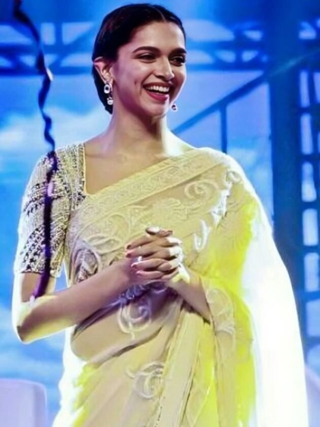 Deepika Padukone in Ivory Embroidered Net Saree with Sequin Blouse