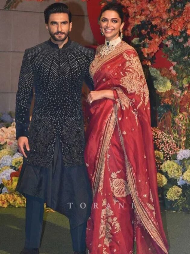 Deepika Padukone in Regal Zardosi Red Wedding Saree with Ranveer Singh