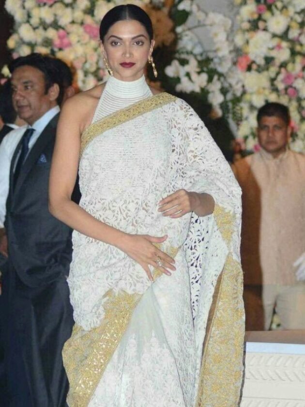 Deepika Padukone in White Lace Saree with Gold Embroidered Border