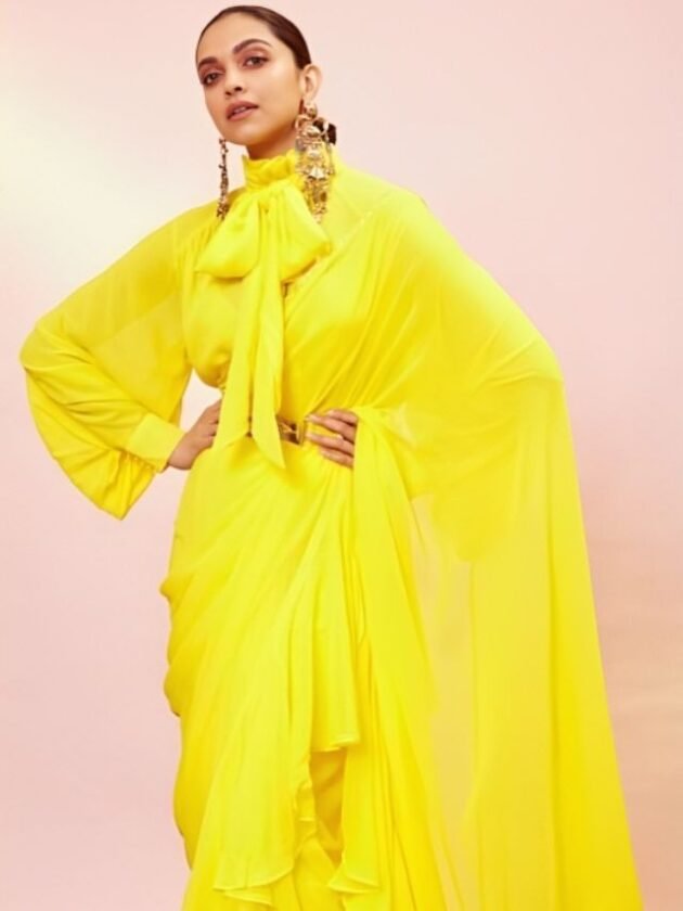 Deepika Padukone in Yellow Ruffle Saree with Bow Neck Blouse