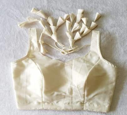 Fancy Off White Sleeveless Cotton Ready Made Blouse