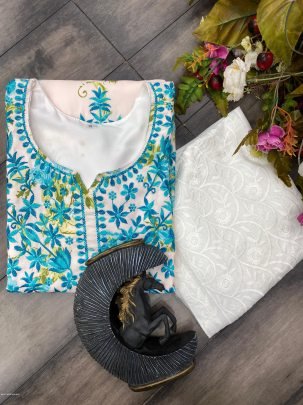 Attractive White And Blue printed rayon Kurti with cotton thread embroidered work palazzo