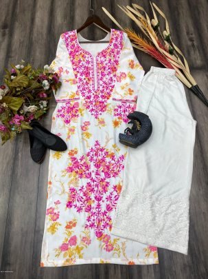 Attractive White And Pink printed rayon Kurti with cotton thread embroidered work palazzo