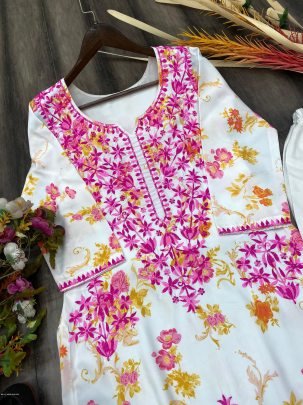 Attractive White And Pink printed rayon Kurti with cotton thread embroidered work palazzo