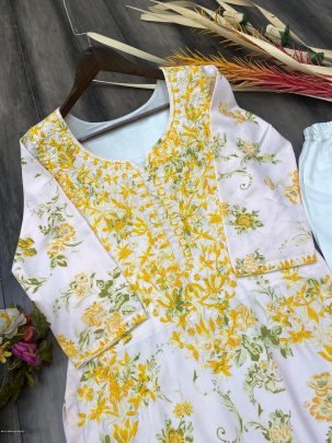 Attractive White And Yellow printed rayon Kurti with cotton thread embroidered work palazzo