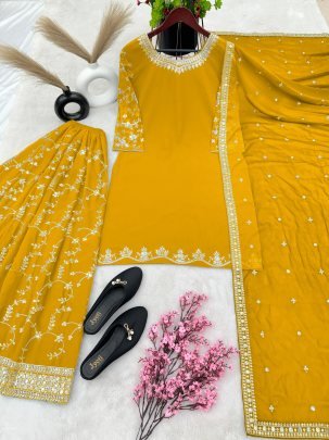 beautiful fashionable Yellow heavy faux georgette with embroidery sequence work sharara suit