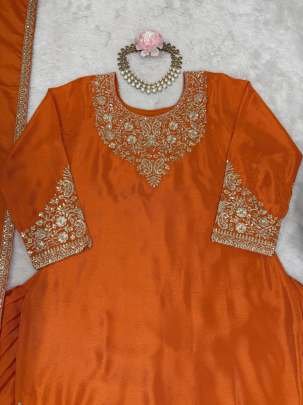 Beautiful Orange Short Kurti And Silk Lehenga With Sequence Work