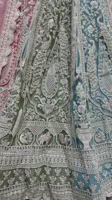 Beautiful Pastel Color Heavy Embroidered  Net Lehenga Choli