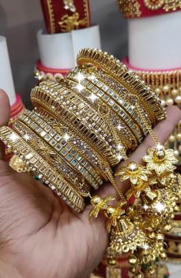 Beautiful Stone Golden Bangles Set with Jhumka Latkan