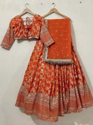 Boutique Collection Jacquard Orange Sequence Work Lehenga Choli