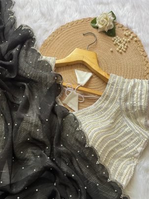 Classic Black Saree with Pearl Embellished White Blouse
