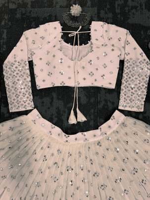 Light Peach Exclusive Designer And Attractive Georgette Lehenga Choli