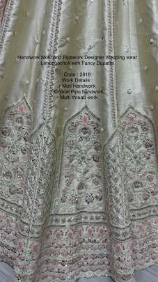 Cream Fancy Embroidery Work Marriage Lehenga Choli With Dupatta