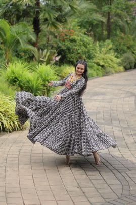 Elegance Redefined     Designer Gown with Traditional Kodi Work