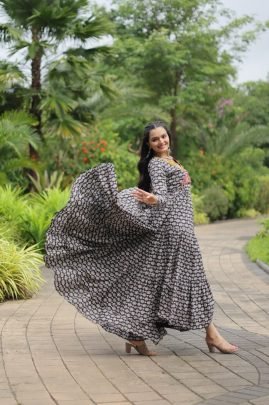 Elegance Redefined     Designer Gown with Traditional Kodi Work