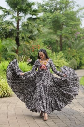 Elegance Redefined     Designer Gown with Traditional Kodi Work