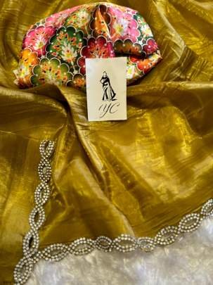 Elegant  Ajarak Print  Gold Soft Tissue Silk Saree