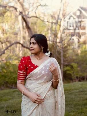 Elegant Puja Special Off White Viscose Saree