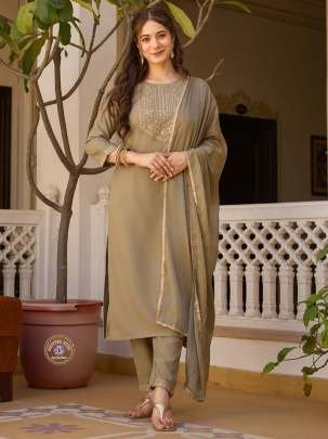 Elegant Tan Colored Soft Rayon Embroidered Kurti Pant And Dupatta Set