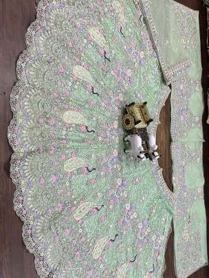 Exclusive Pista Soft Butterfly Net Lehenga Choli With 4 Meter Flair
