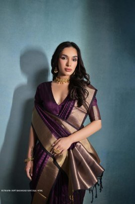 Exclusive Wine Soft Banarasi raw silk saree with zari lining pattern
