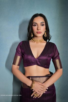 Exclusive Wine Soft Banarasi raw silk saree with zari lining pattern