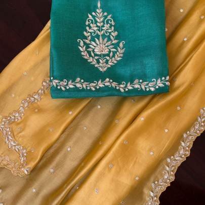 haldi special mustard yellow tebby silk saree with tread and moti work