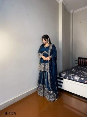 Heavy Faux Georgette Sharara Suit Embroidery And Sequence Work