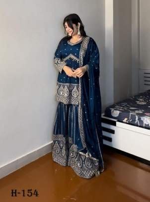 Heavy Faux Georgette Sharara Suit Embroidery And Sequence Work