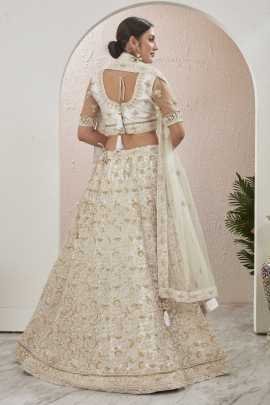 Off White Stone and Embroidered Work Net Lehenga choli