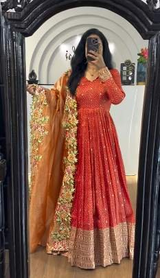 Orange Heavy Embroidery Sequence Work Stitched Gown With Dupatta