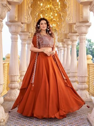 Orange Rangoli Silk Lehenga With Heavy Blouse And Shrug