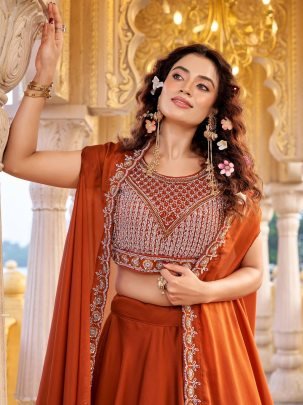 Orange Rangoli Silk Lehenga With Heavy Blouse And Shrug