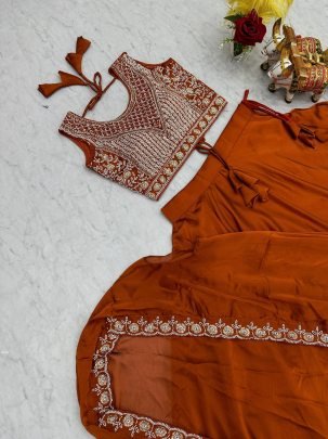 Orange Rangoli Silk Lehenga With Heavy Blouse And Shrug