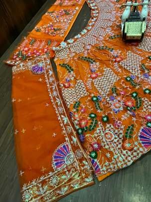 Orange Sequins Embroidery Work Butterfly Net Lehenga Choli