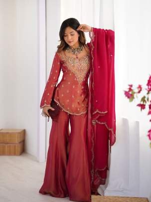 Stylish Pink Embroidered Kurti With Flared Palazzo And Dupatta Set