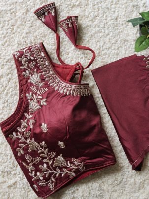 Presenting Elegant Maroon Blouse With Embroidery Work