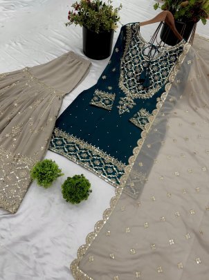 Presenting Rama Sharara Suit With Embroidery Work