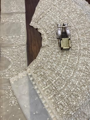 Presenting Wedding Wear Beautiful Butterfly Net Beige Lehenga