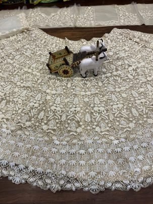 Presenting Wedding Wear Beautiful Butterfly Net Beige Lehenga