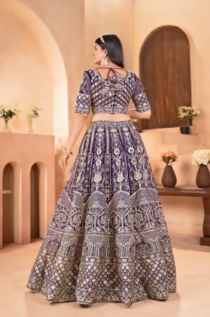 Purple Net Lehenga Choli with Zari And Sequins Embroidery