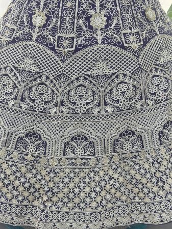 Purple Net Lehenga Choli with Zari And Sequins Embroidery