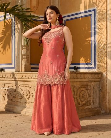 Stunning Sleeveless Party Wear Peach Sharara Suit