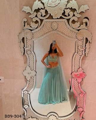 Stunning Turquoise Faux Georgette Lehenga Choli