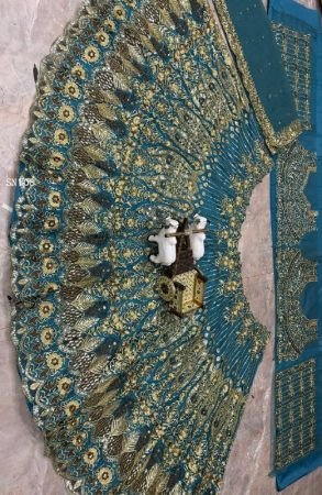 Teal Blue Butterfly Net Lehenga Choli With Sequence Work For Bride