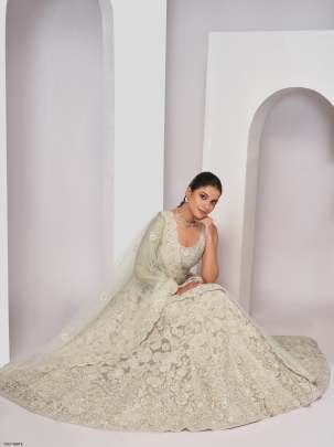 Traditional Wear White Soft Net Embroidery Lehenga Choli