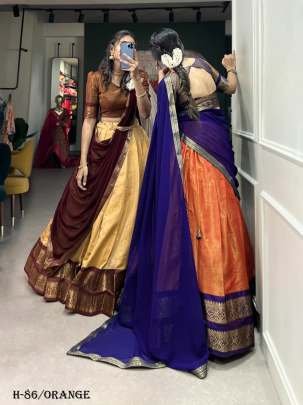 Trendy Kanchipuram Silk Orange Lehenga Choli With Blue Dupatta