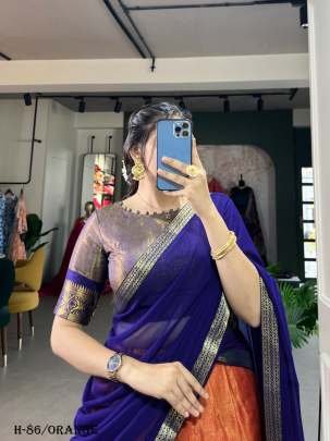 Trendy Kanchipuram Silk Orange Lehenga Choli With Blue Dupatta